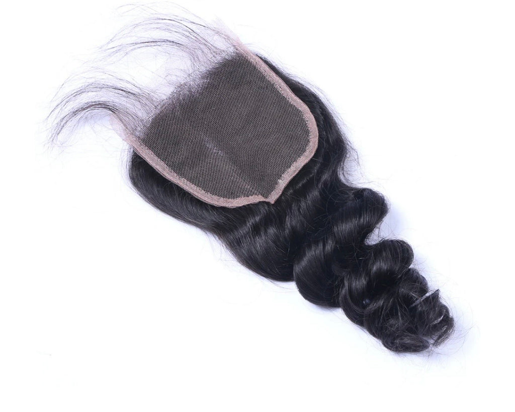 Loose wave 4x4 lace closure in natural black 1B, showing soft bouncy curl pattern and full hair volume, 100% virgin human hair by Fridalicious