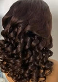 Close-up of brunette formal spiral curls for bridal hairstyle